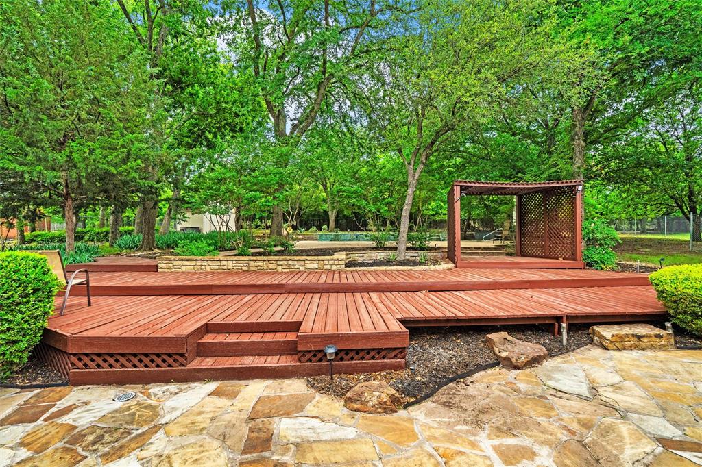 217 Valley Ranch Road Weatherford, TX 76087 - Photo 32 of 38 Multi-level wood deck featuring integrated steps and a lattice-sided pergola