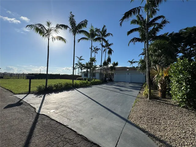 a view of a backyard with a garden