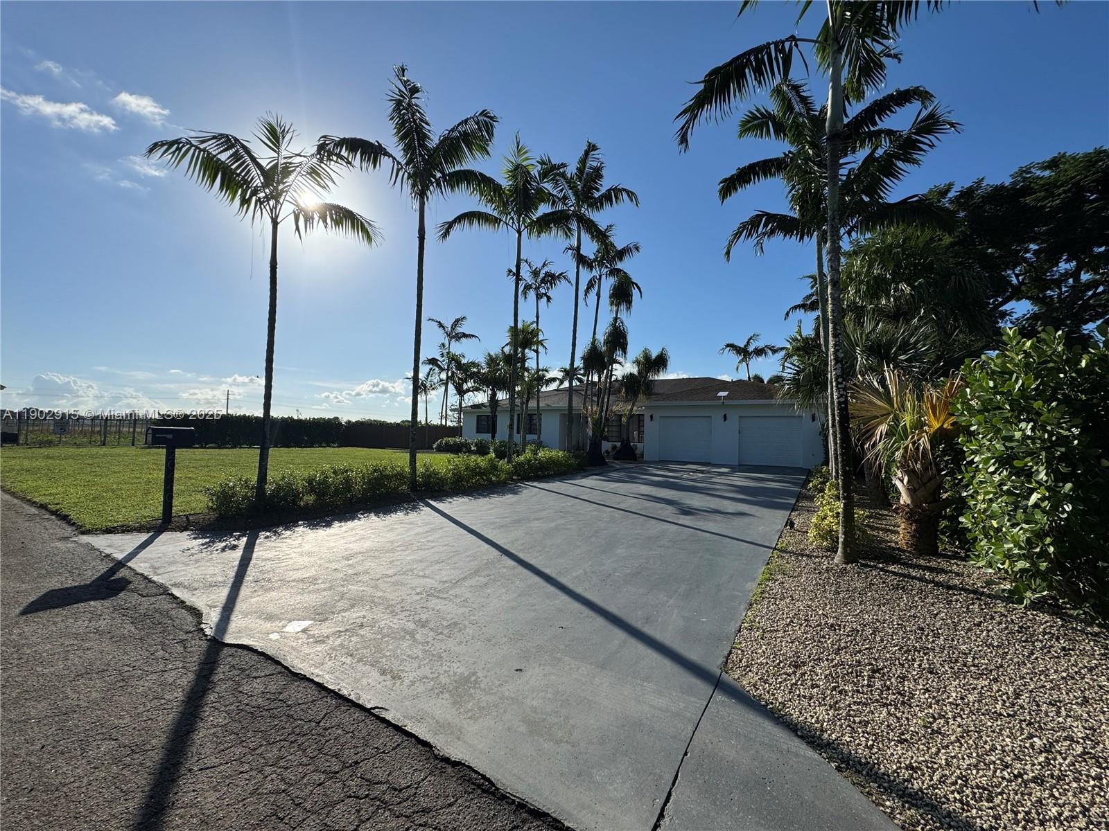 a view of a backyard with a garden