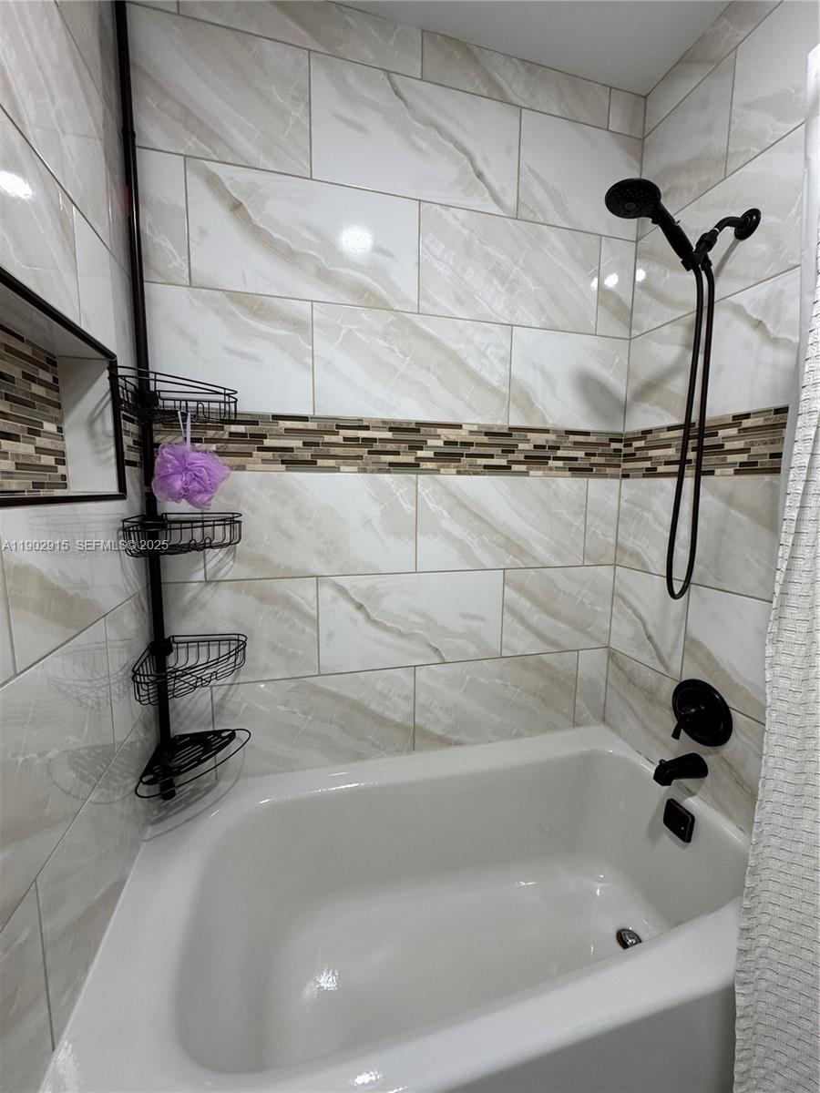 20440 Southwest 292nd Street Homestead, FL 33030 - Photo 37 of 57 a bathroom with a shower