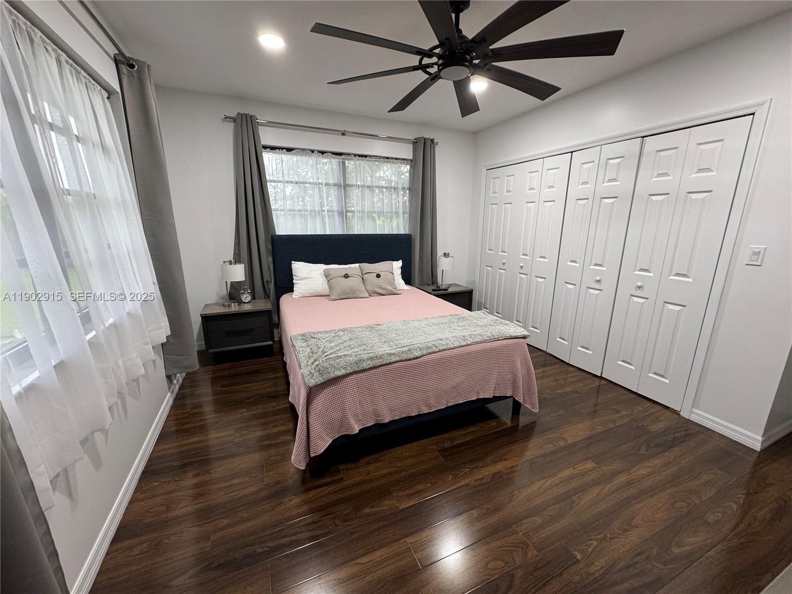 20440 Southwest 292nd Street Homestead, FL 33030 - Photo 46 of 57 a bedroom with a bed and a window