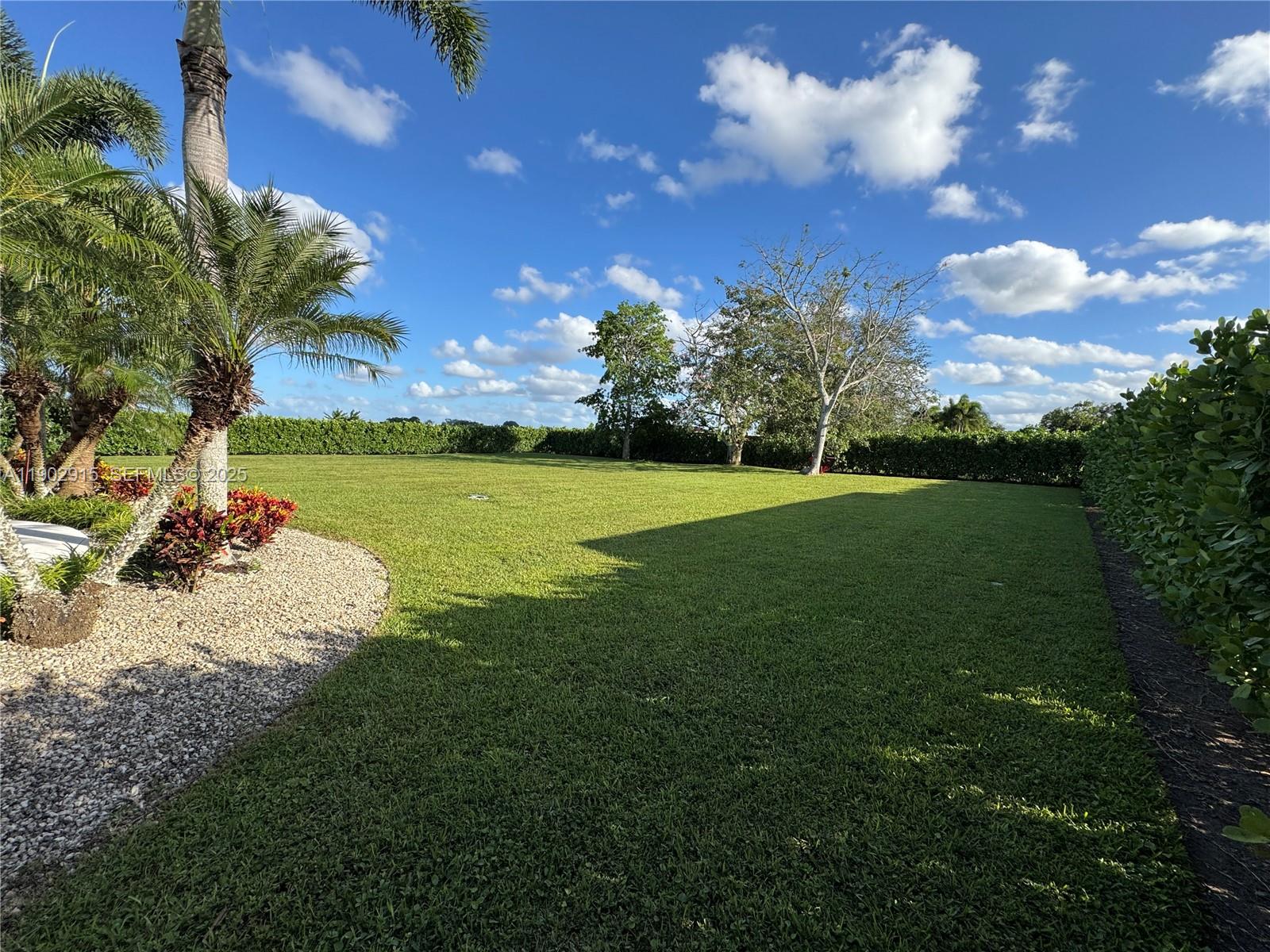 20440 Southwest 292nd Street Homestead, FL 33030 - Photo 56 of 57 a view of a golf course with a house