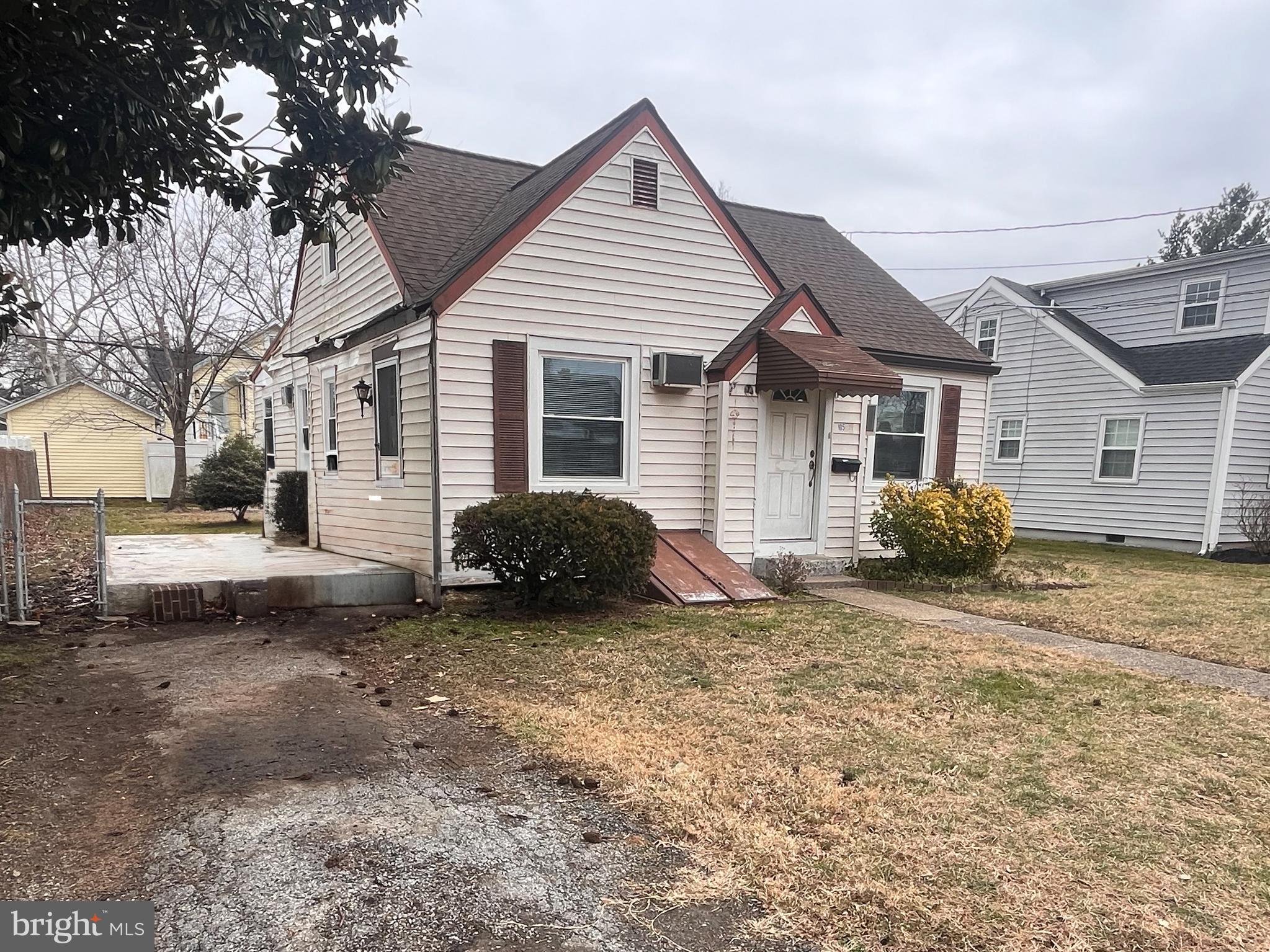 105 Harding Avenue Wilmington, DE 19804 - Photo 2 of 16 a view of a house with a yard and a large tree