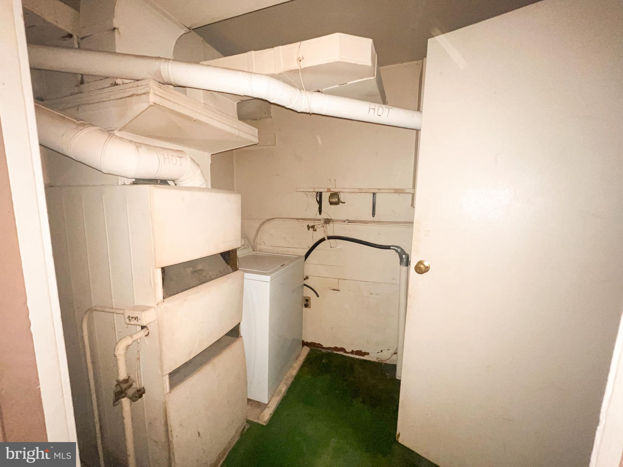 105 Harding Avenue Wilmington, DE 19804 - Photo 10 of 16 a view of storage and utility room with a washer dryer