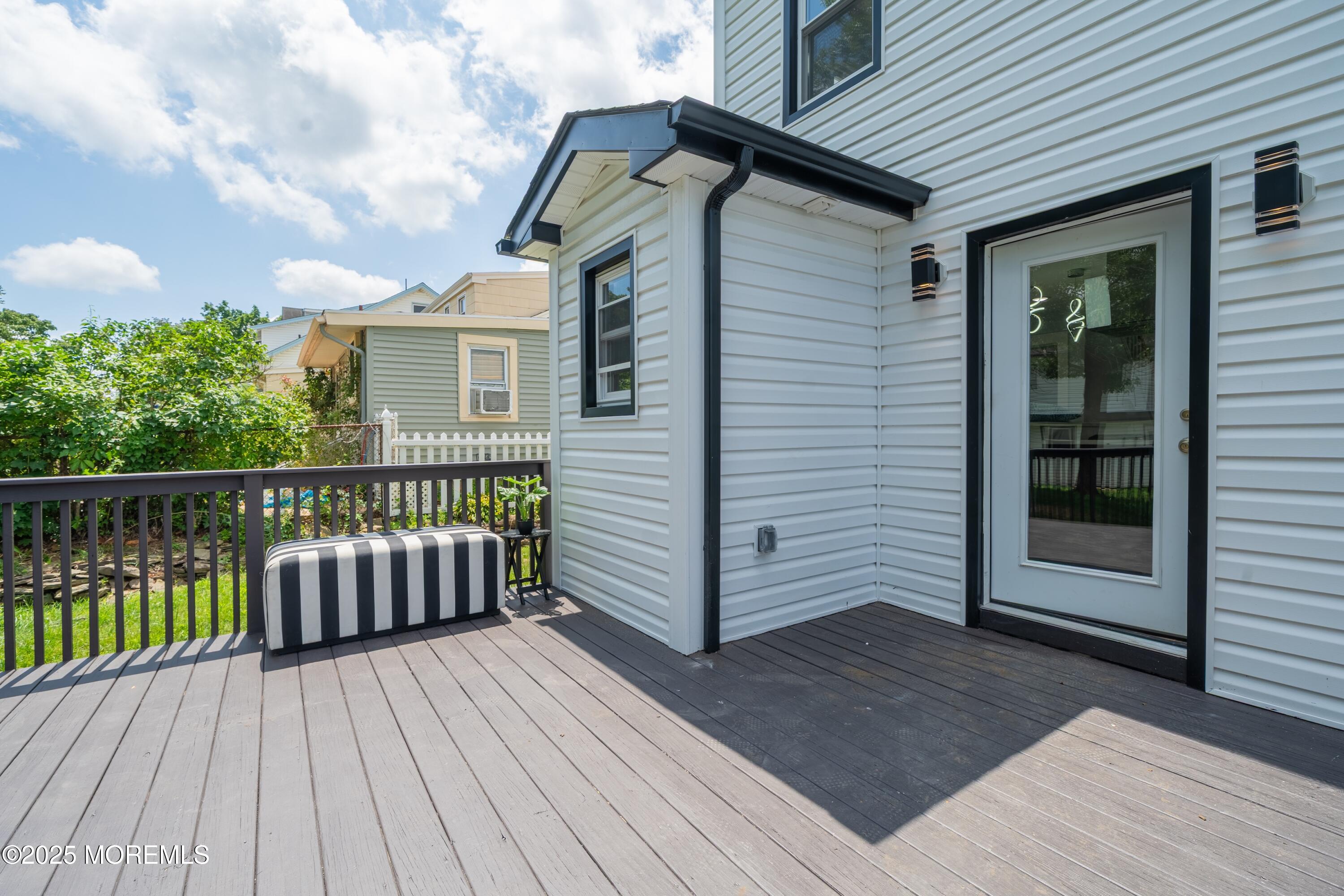 101 Broad Street Matawan, NJ 07747 - Photo 13 of 44 a view of a wooden deck