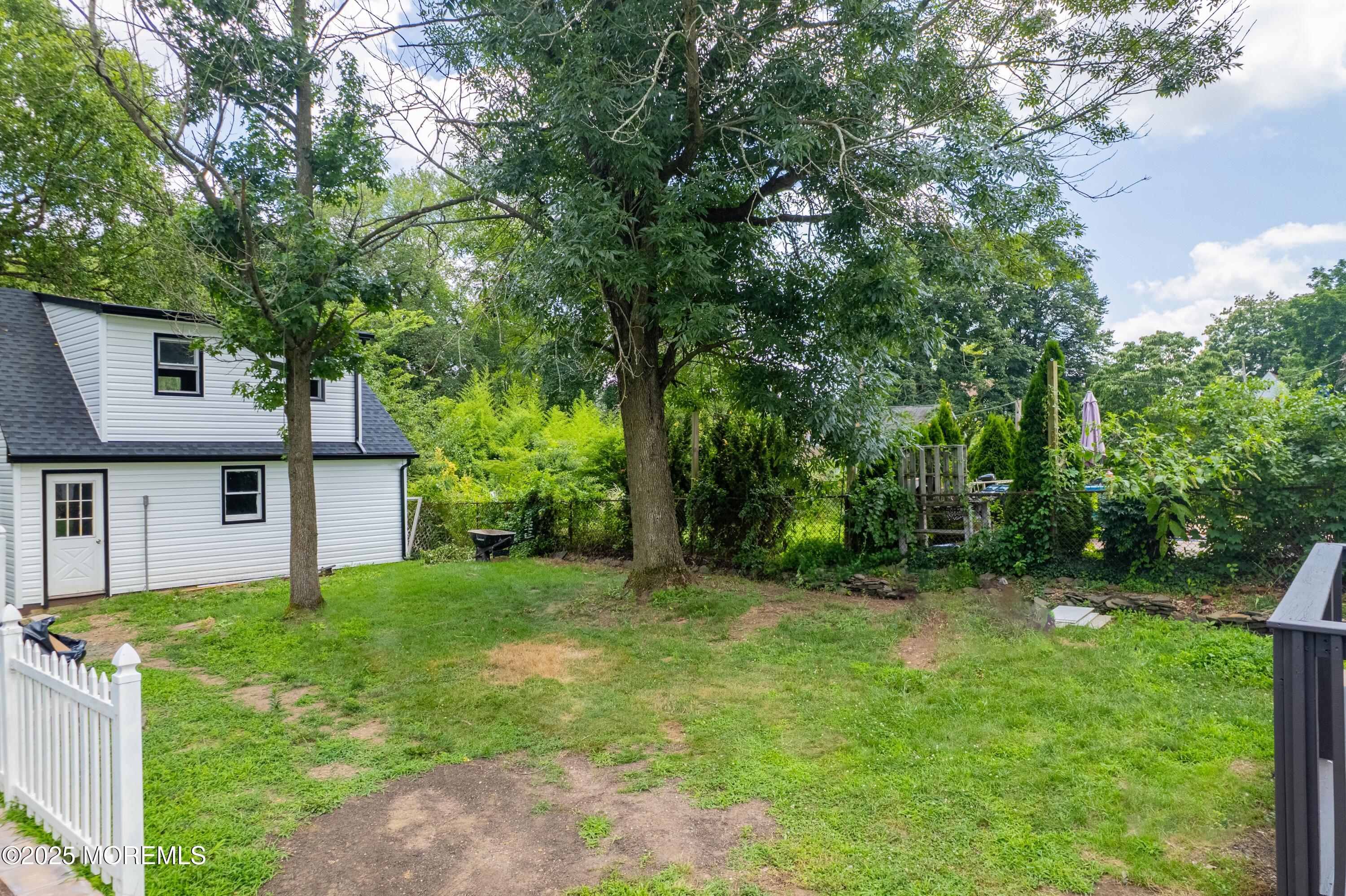 101 Broad Street Matawan, NJ 07747 - Photo 14 of 44 front view of a house with a yard