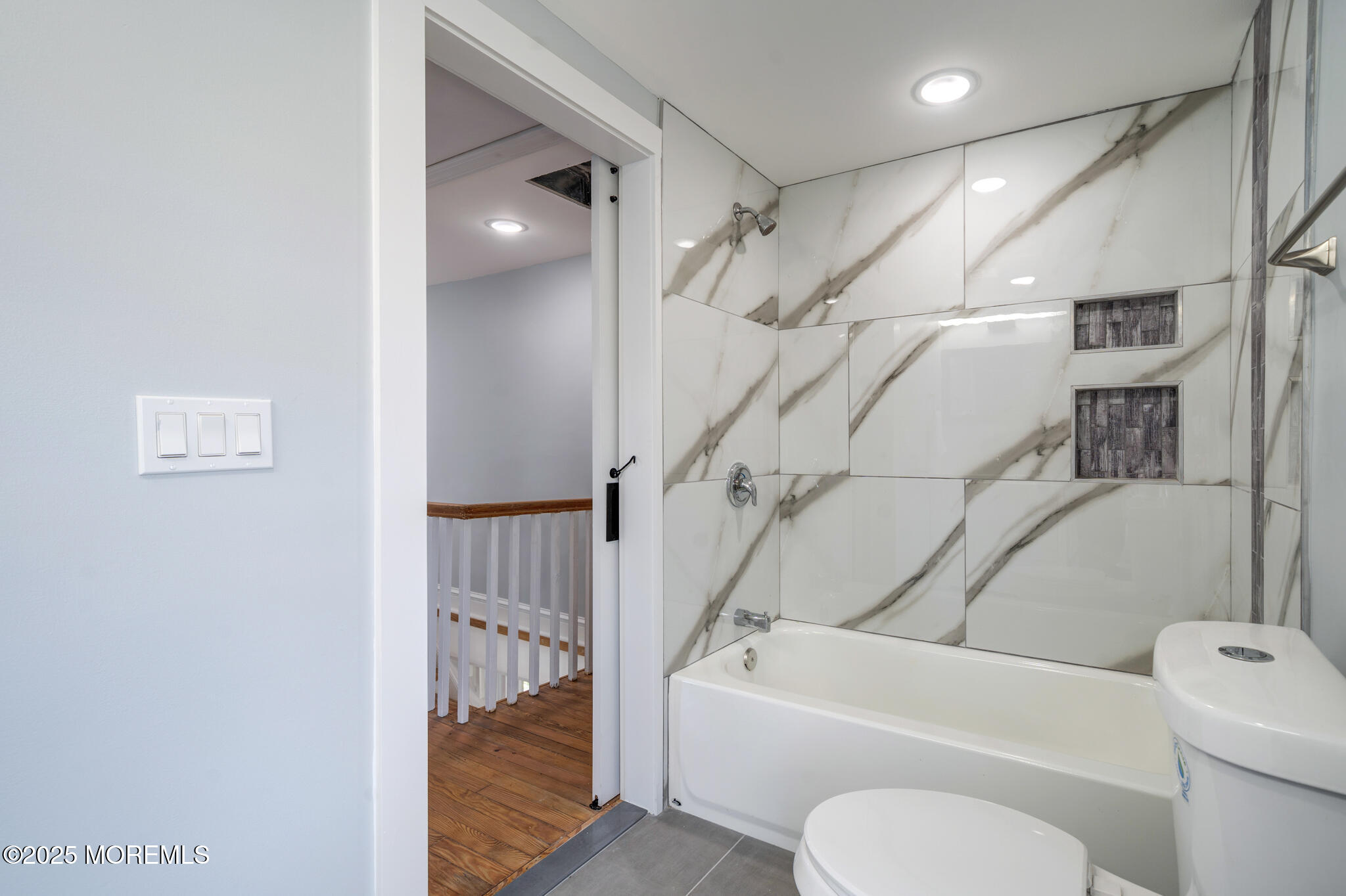 101 Broad Street Matawan, NJ 07747 - Photo 34 of 44 a bathroom with a toilet a sink and bathtub