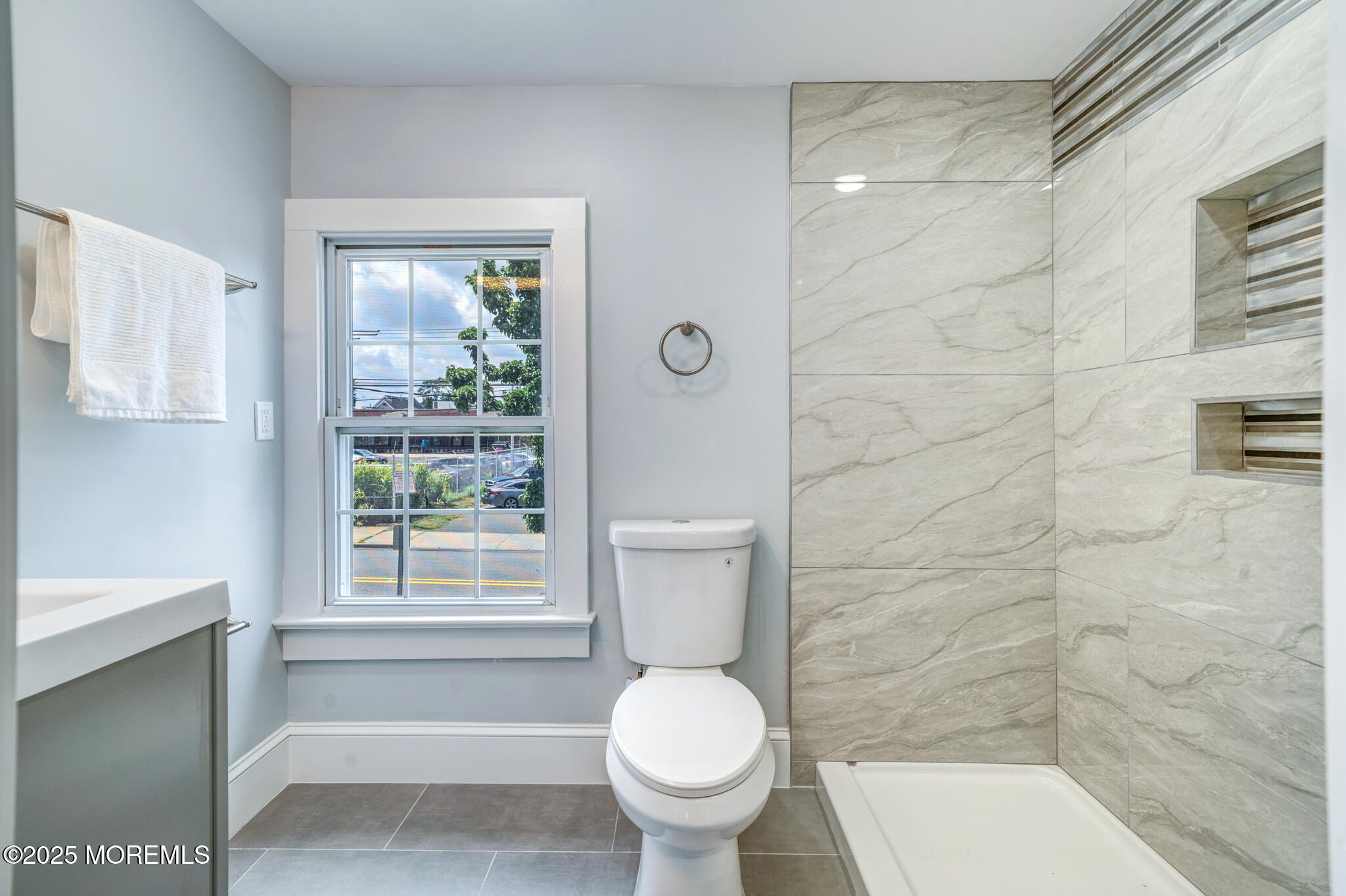 101 Broad Street Matawan, NJ 07747 - Photo 35 of 44 a bathroom with a toilet and a shower