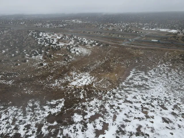 a view of a lake with a big yard