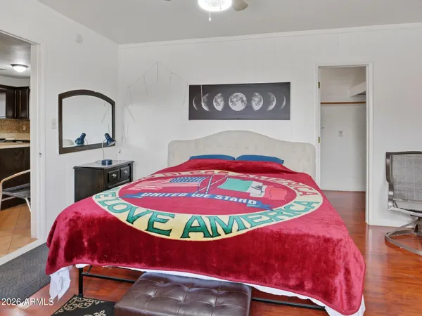 a room with furniture and mirror