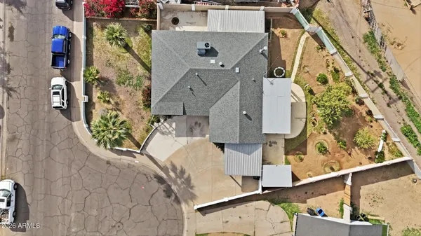 an aerial view of residential house with outdoor space