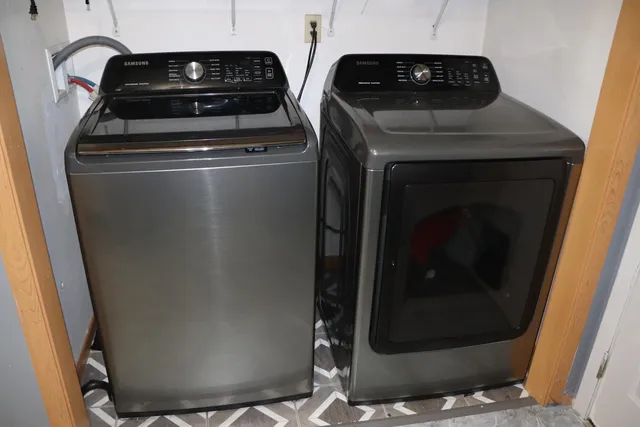 a close up view of washer and dryer