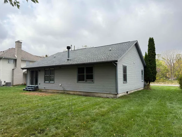 a front view of house with yard
