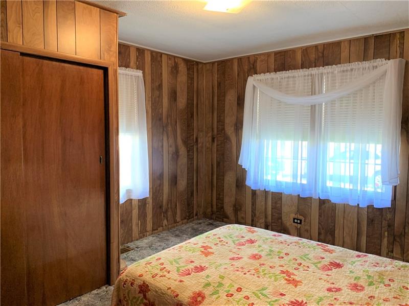 411 Ridge Avenue Canonsburg, PA 15317 - Photo 14 of 17 Second bedroom on main level is 12x13. It's located on the other side of the house from the other bedroom