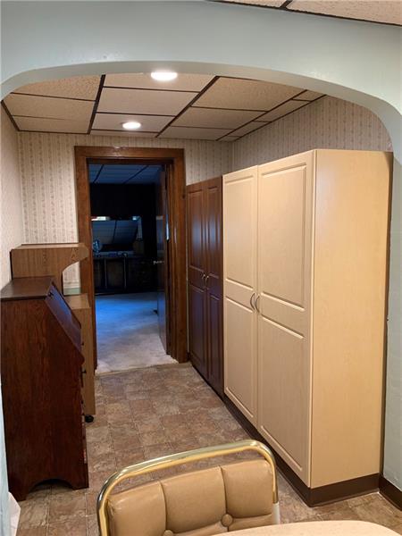 411 Ridge Avenue Canonsburg, PA 15317 - Photo 9 of 17 Additional room between the kitchen and master bedroom. Cabinets on the right side stay.