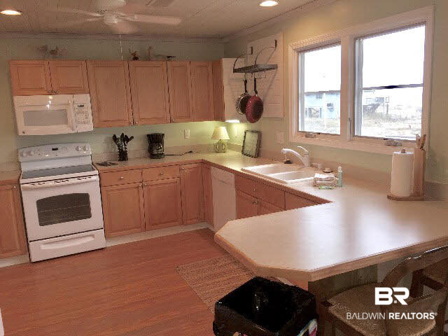 8749 Pompano Way Gulf Shores, AL 36542 - Photo 10 of 45 well stocked