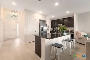 a lobby with furniture and potted plant