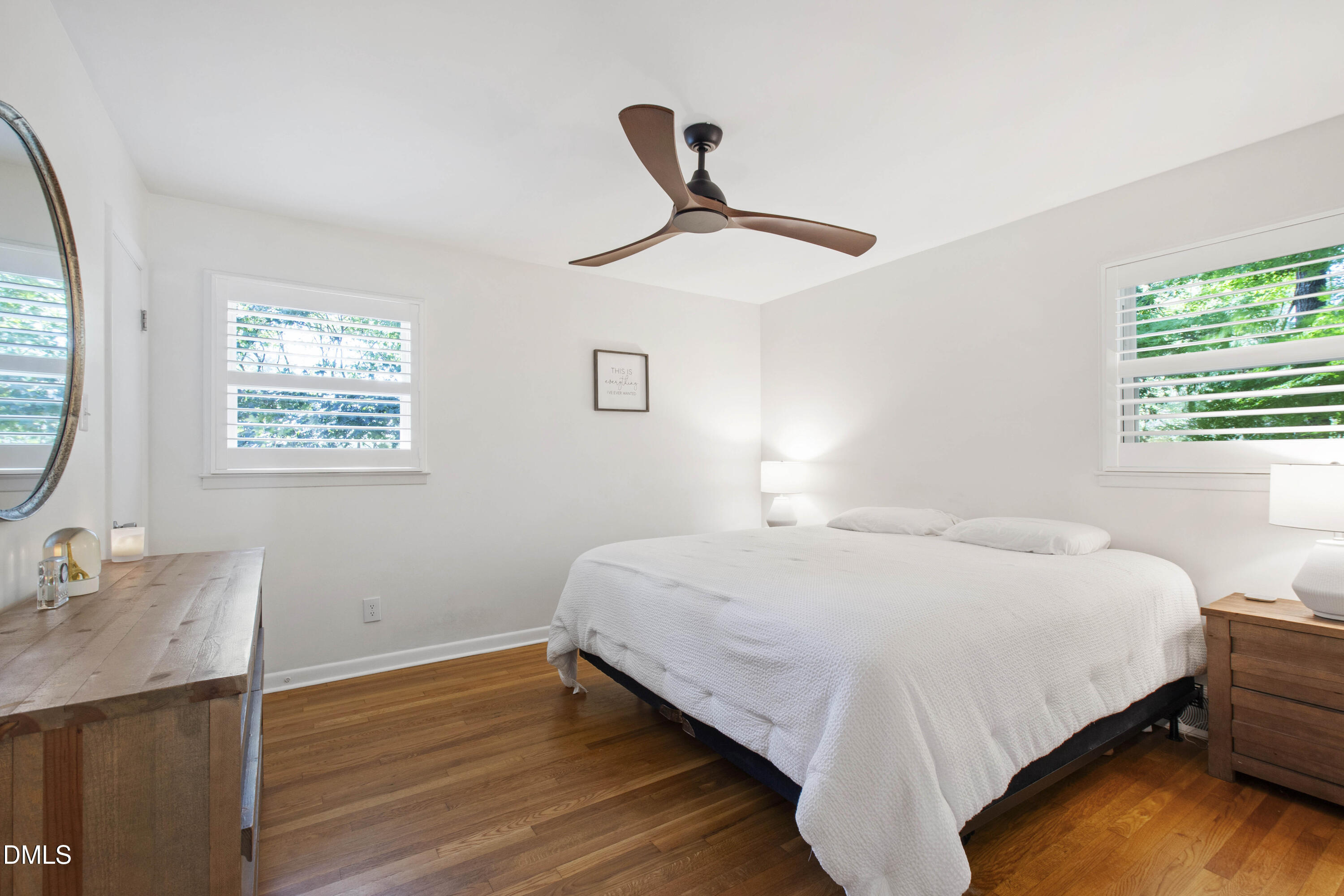 304 Latimer Road Raleigh, NC 27609 - Photo 13 of 42 a bedroom with a bed and a table