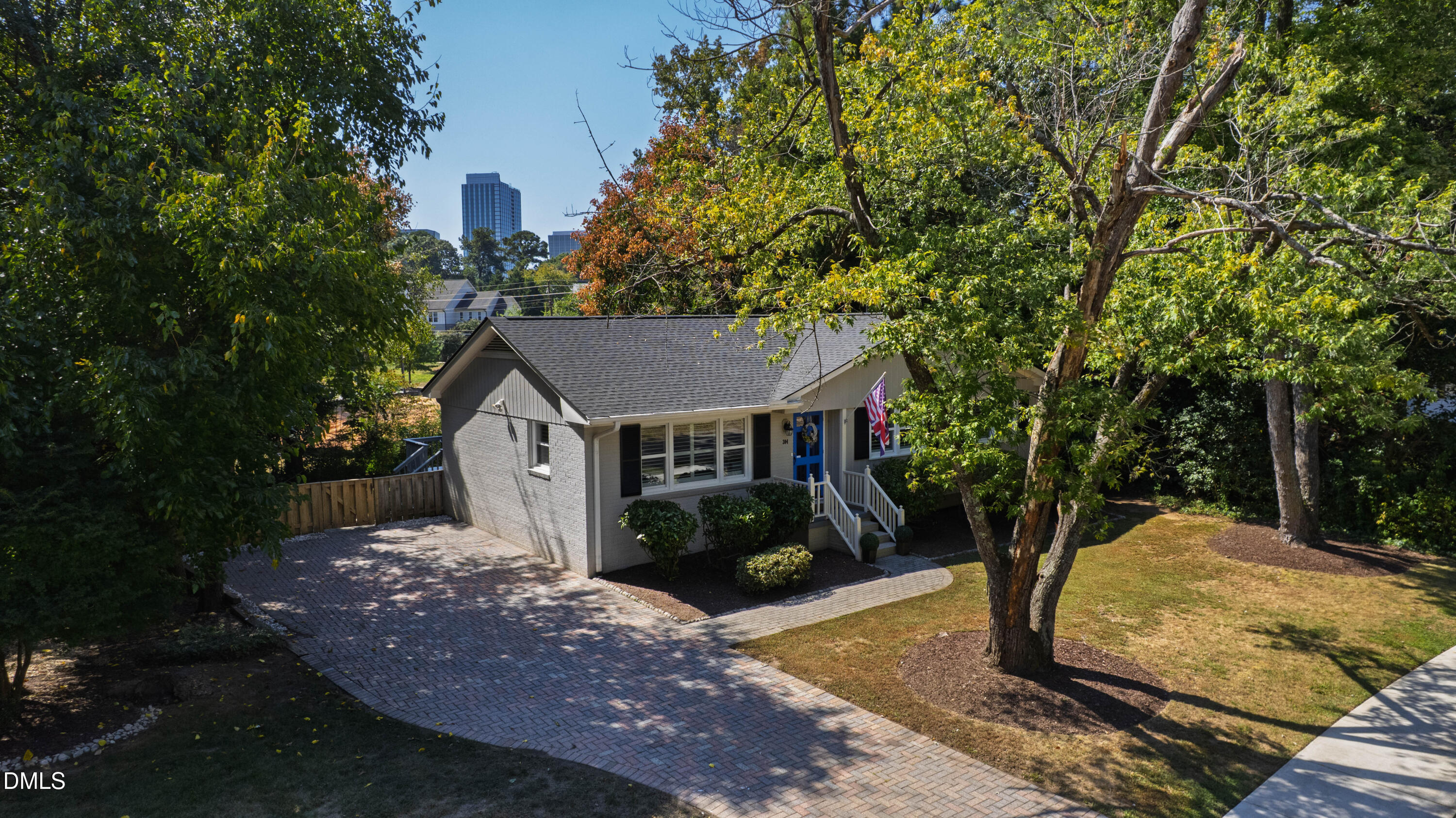 304 Latimer Road Raleigh, NC 27609 - Photo 2 of 42 a view of a house with a yard