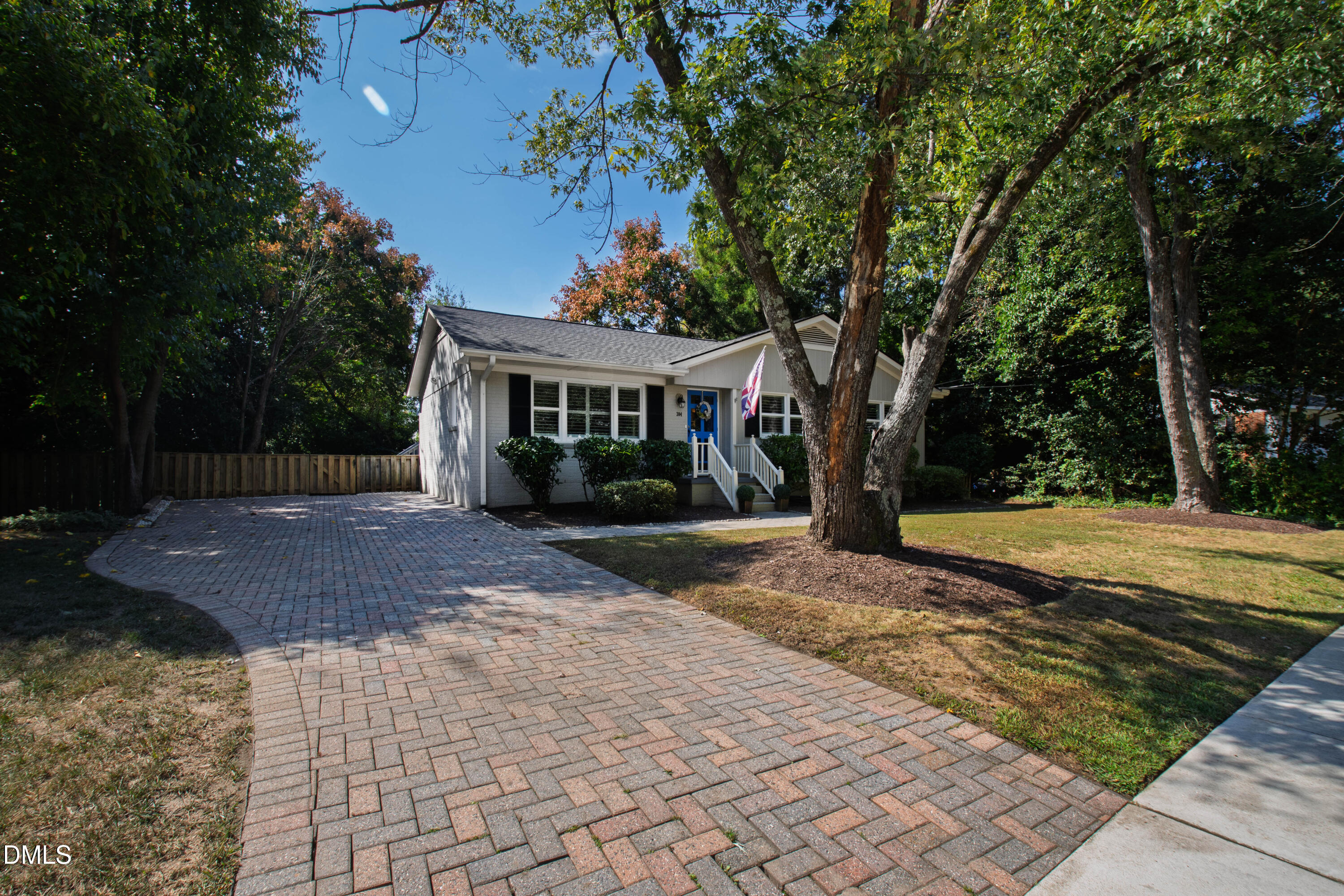 304 Latimer Road Raleigh, NC 27609 - Photo 4 of 42 a view of a house with a yard