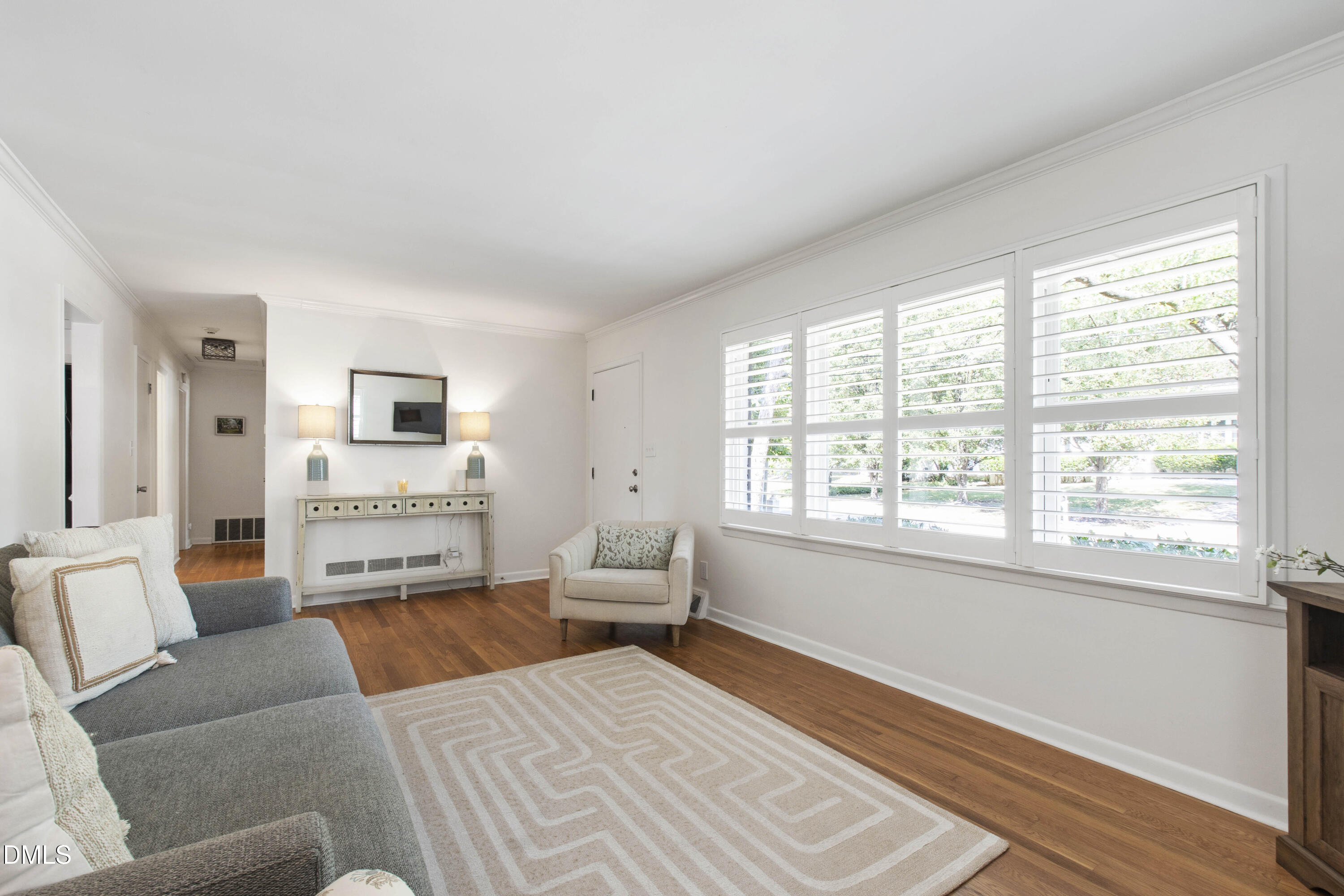 304 Latimer Road Raleigh, NC 27609 - Photo 6 of 42 a living room with furniture and a large window