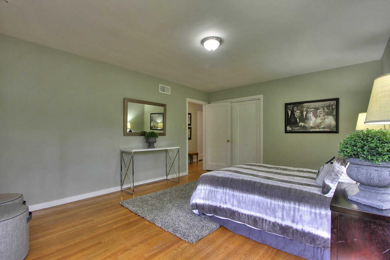 35 Selby Lane Atherton, CA 94027 - Photo 15 of 30 a bedroom with a bed and a view of kitchen