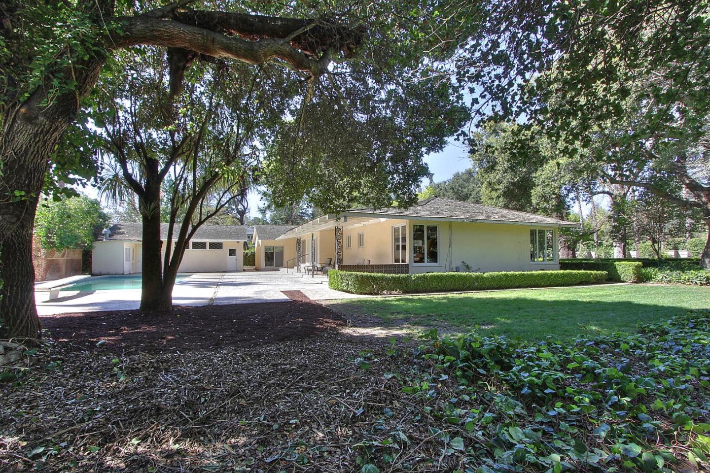 35 Selby Lane Atherton, CA 94027 - Photo 26 of 30 a view of a house with backyard and trees