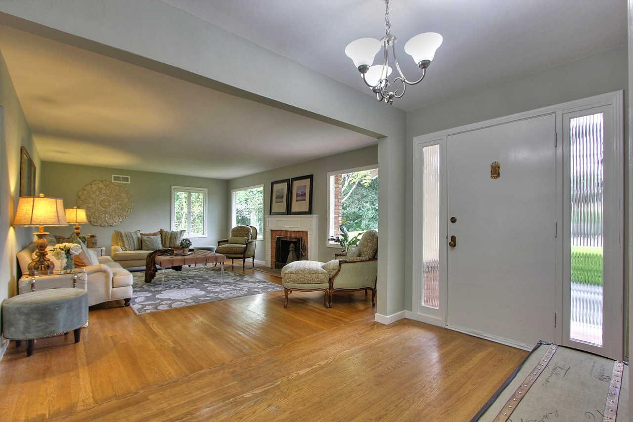 35 Selby Lane Atherton, CA 94027 - Photo 4 of 30 a living room with fireplace furniture and a chandelier