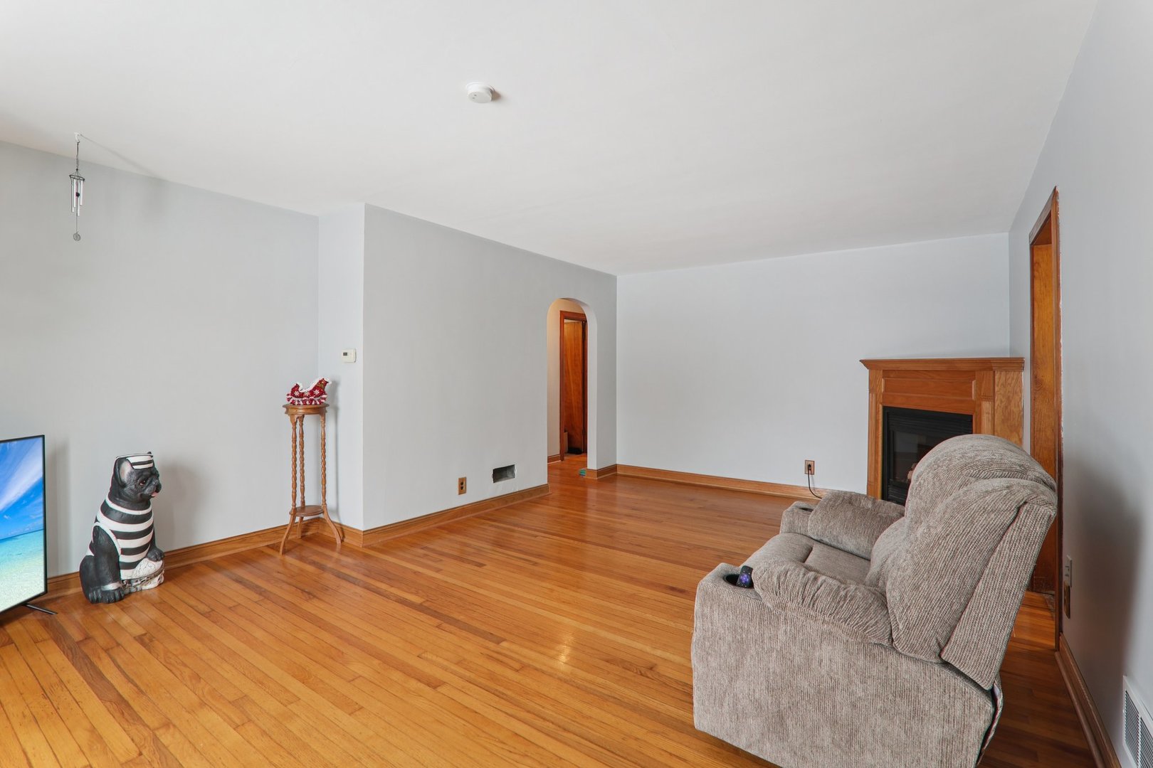 8033 Austin Avenue Burbank, IL 60459 - Photo 4 of 19 a bed room with a bed and a chair