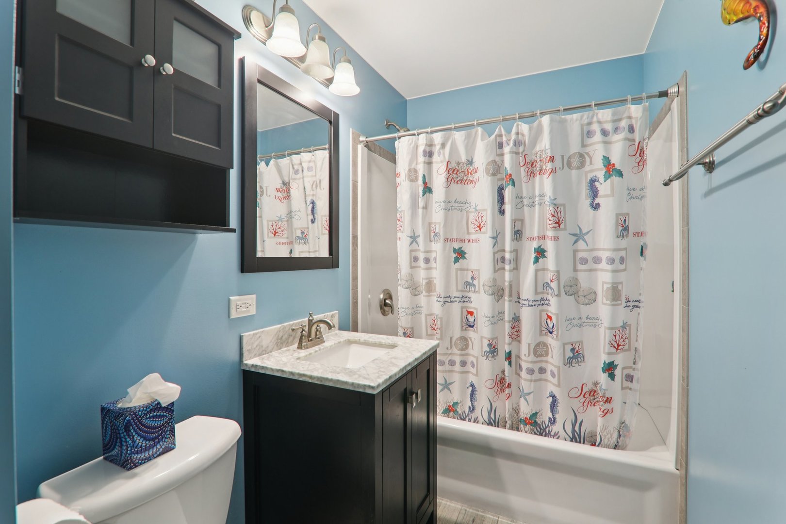 8033 Austin Avenue Burbank, IL 60459 - Photo 9 of 19 a bathroom with a sink and a mirror