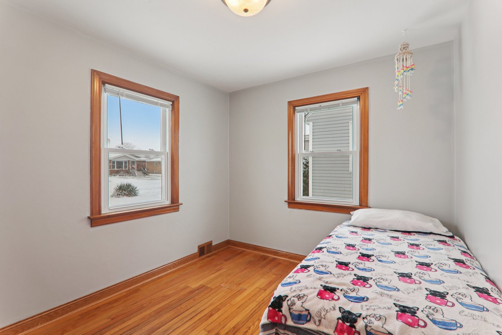 8033 Austin Avenue Burbank, IL 60459 - Photo 10 of 19 a bedroom with bed and a window