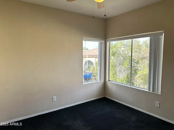 a view of a back yard of the house