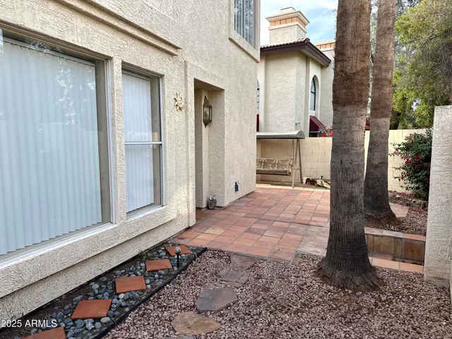 a view of a back yard of the house