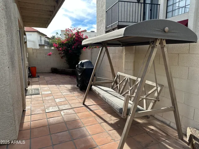 an outdoor space with patio area