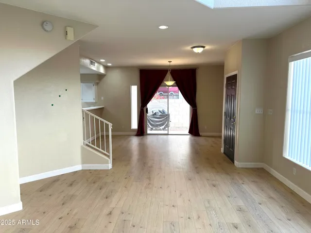 a room with fireplace and window