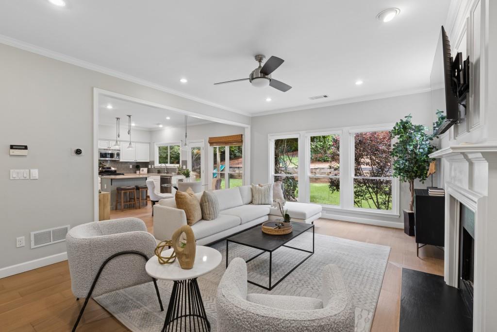2120 Traywick Chase Alpharetta, GA 30004 - Photo 22 of 54 a living room with fireplace furniture and a flat screen tv