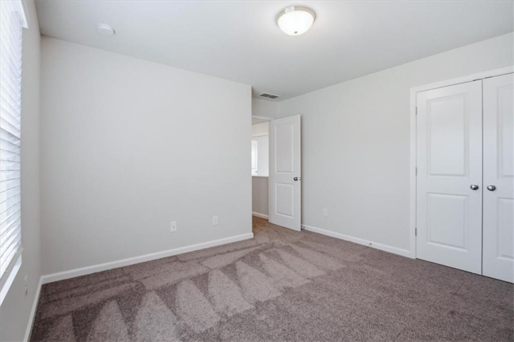 585 Summit Point Canton, GA 30114 - Photo 20 of 30 a view of an empty room and window