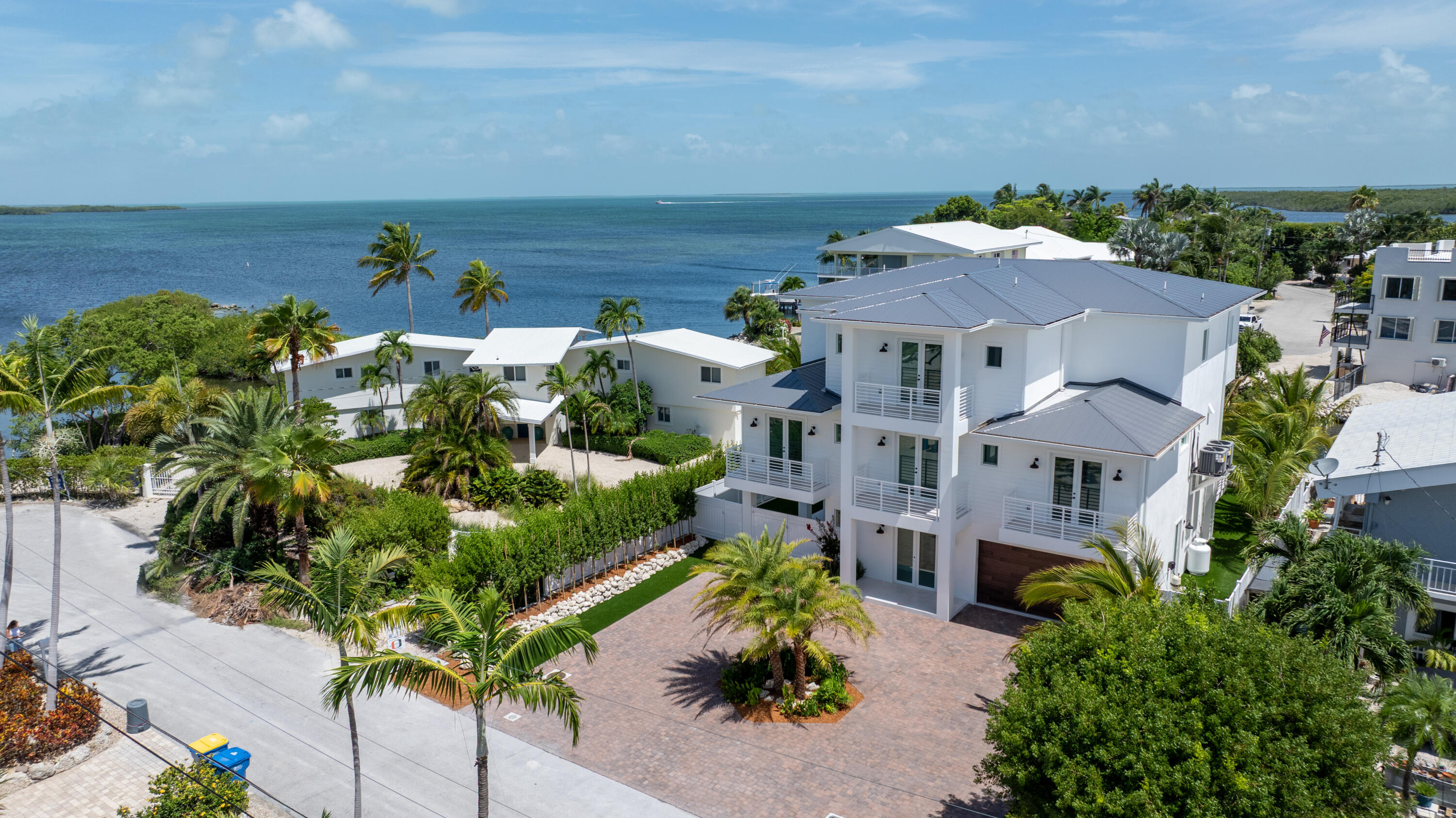 206 Plantation Avenue Tavernier, FL 33070 - Photo 68 of 81 an aerial view of multiple houses with a yard