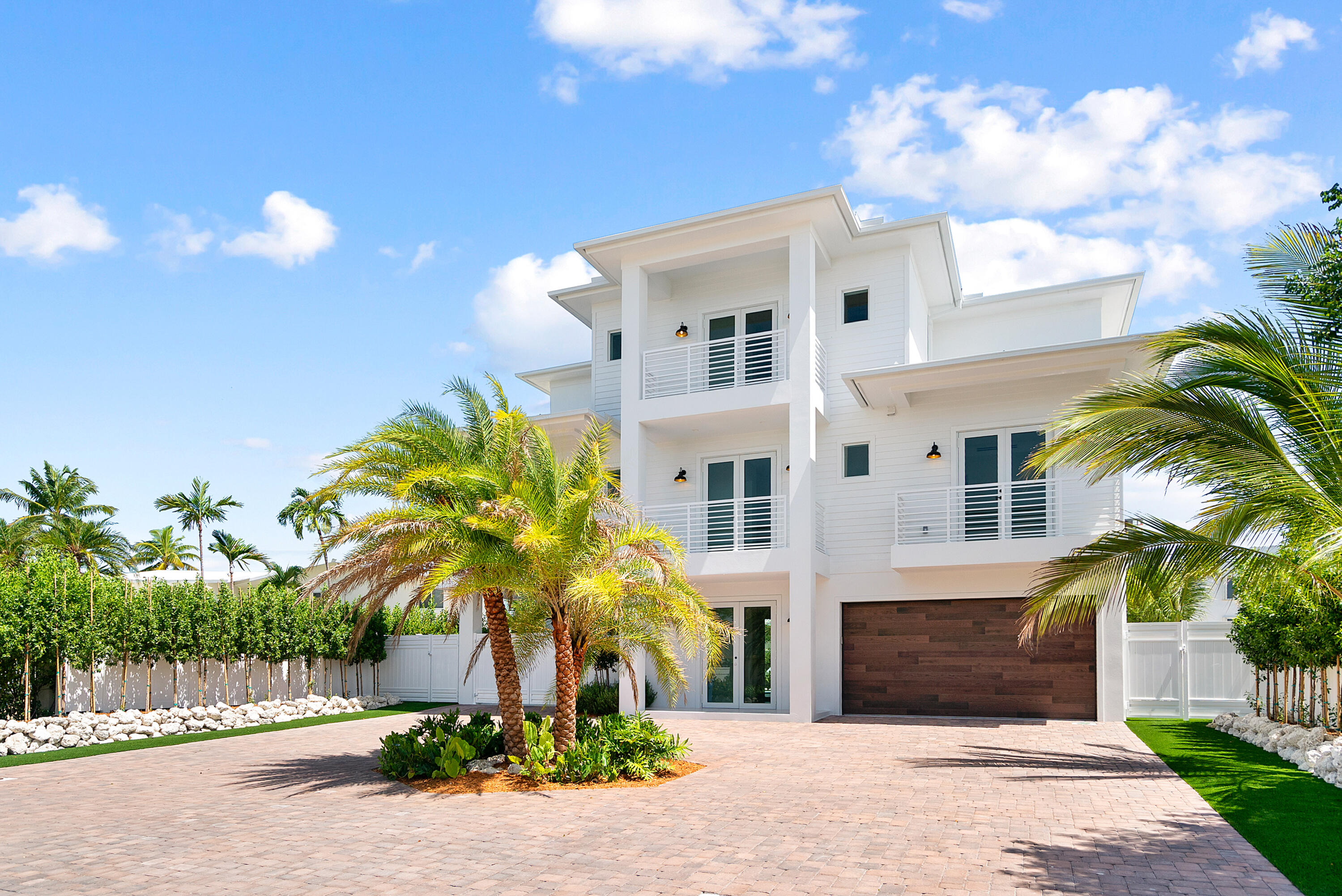 206 Plantation Avenue Tavernier, FL 33070 - Photo 75 of 81 a front view of a house with a yard and potted plants