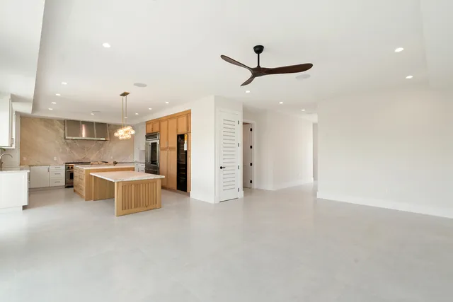 an empty room with closet area