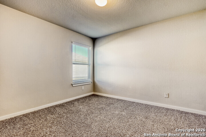 10583 Penelope Way Converse, TX 78109 - Photo 19 of 26 an empty room with a window