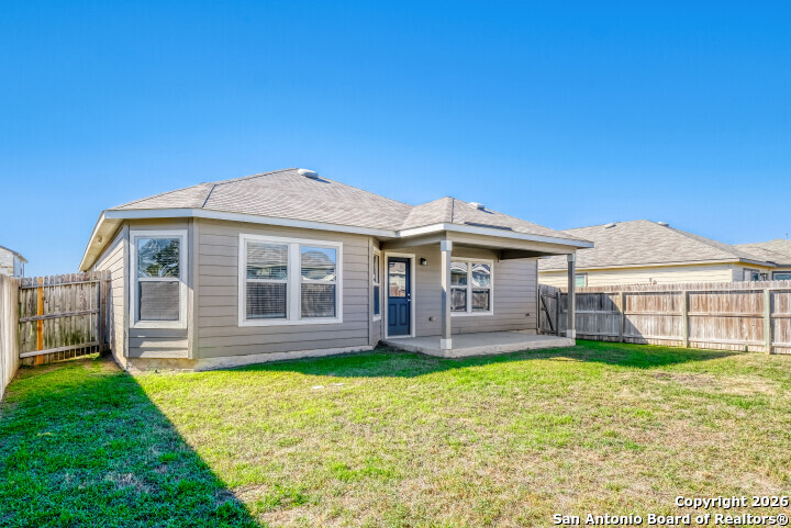 10583 Penelope Way Converse, TX 78109 - Photo 24 of 26 a front view of a house with a yard