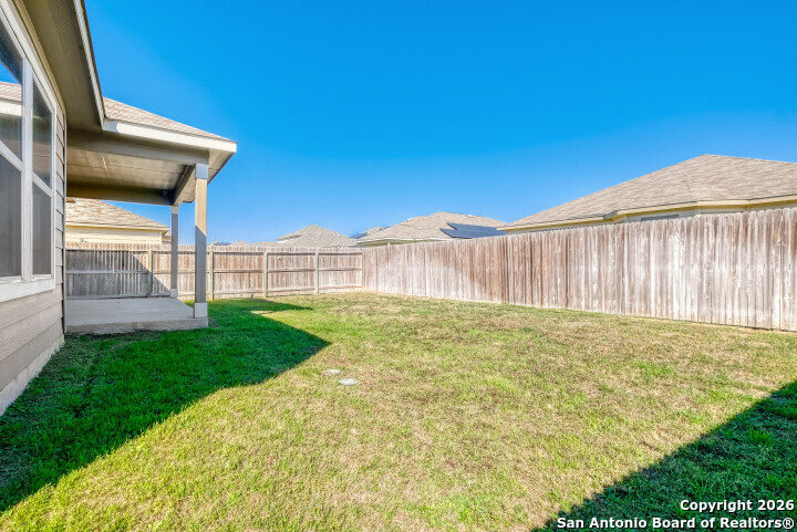 10583 Penelope Way Converse, TX 78109 - Photo 25 of 26 a view of back yard of the house