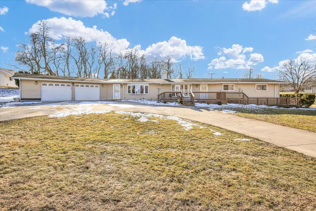 a view of a backyard with large trees