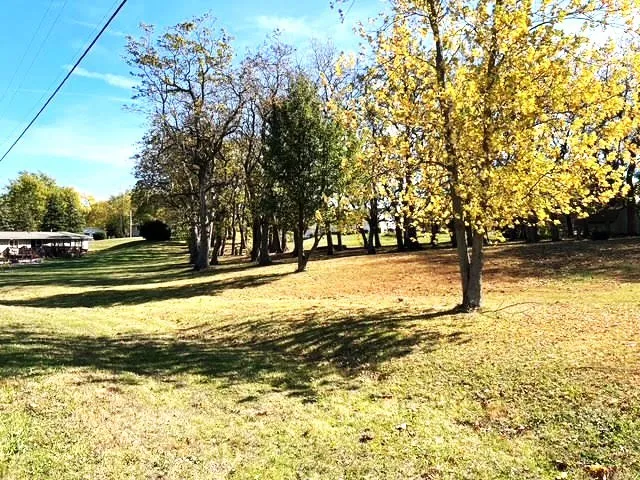 a view of swimming pool with an outdoor space and seating area