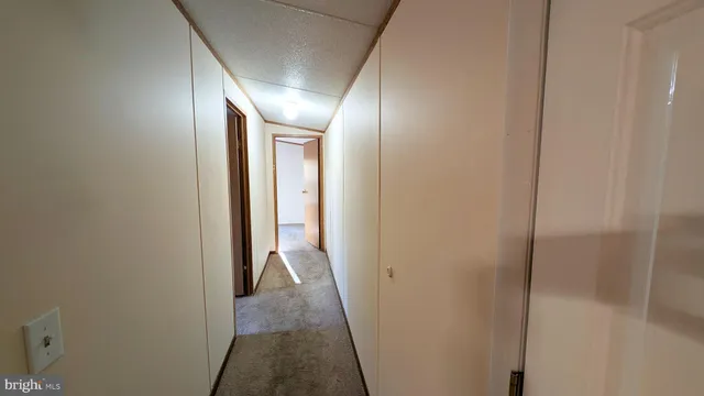a view of hallway with stairs