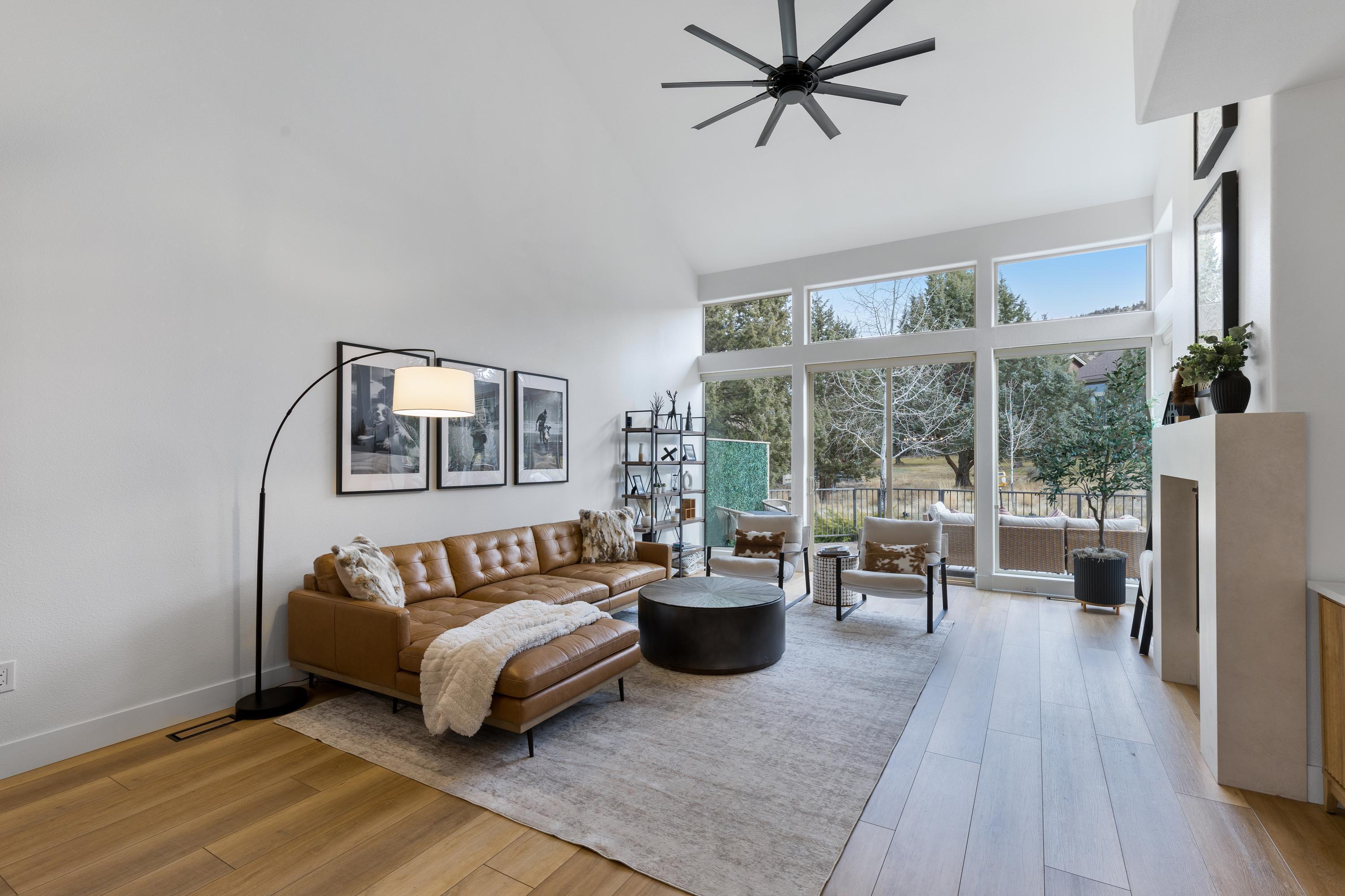 1281 Highland View Loop Redmond, OR 97756 - Photo 8 of 42 Vaulted ceilings and natural light invite rest and relaxation.