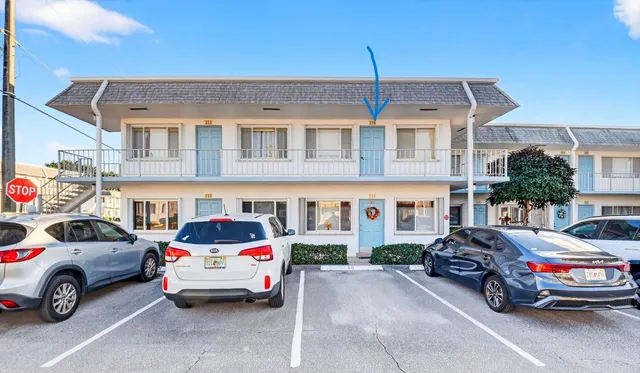 a car parked in front of a house