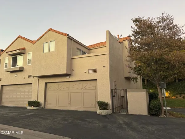 front view of a house with a street