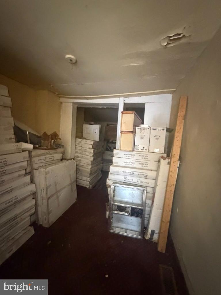 1612 Lemmon Street Baltimore, MD 21223 - Photo 6 of 20 a room with storage and utility